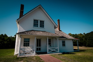 a white house with a chimney