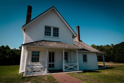 a white house with a chimney