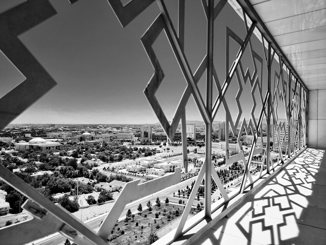 a building with a large glass wall,