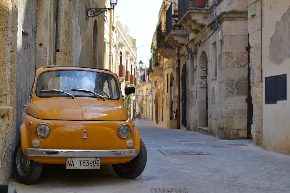 a car parked in a narrow alley