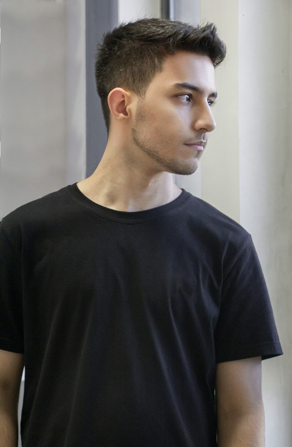 a man wearing a black shirt