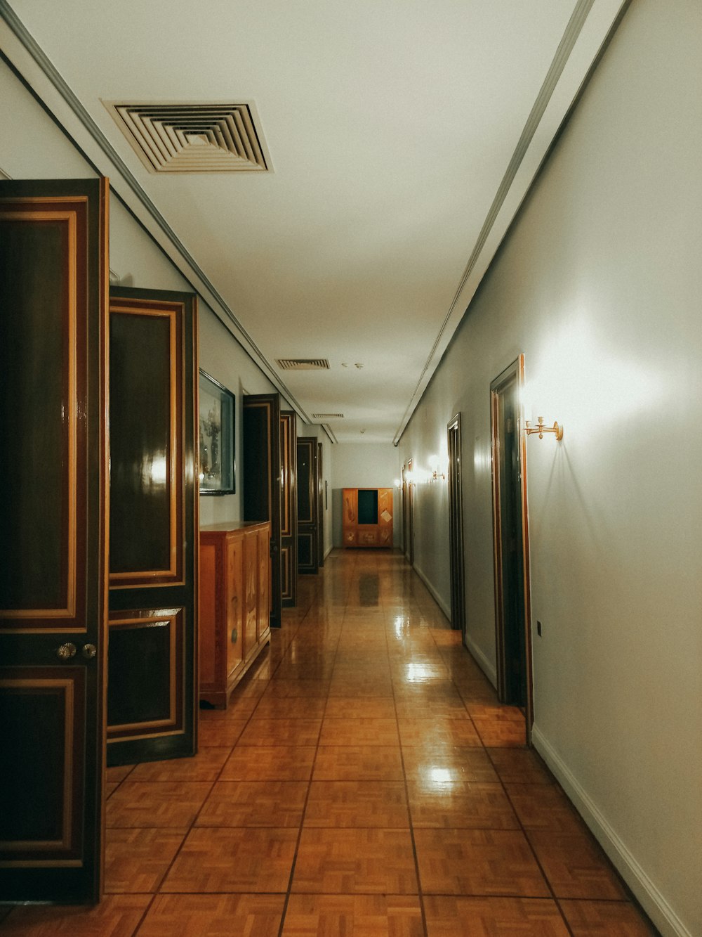 a hallway with wood floors