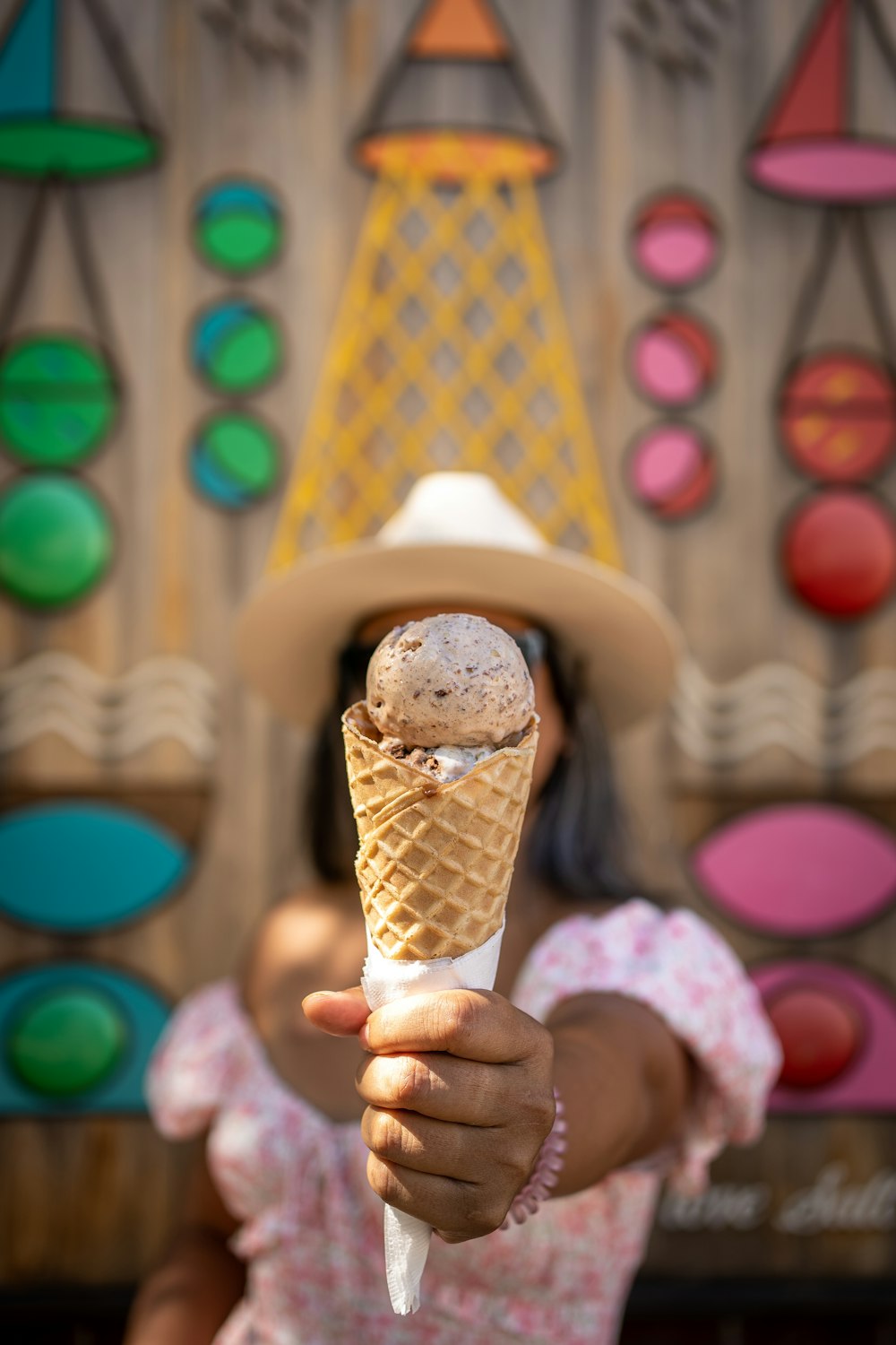 a baby holding an ice cream cone