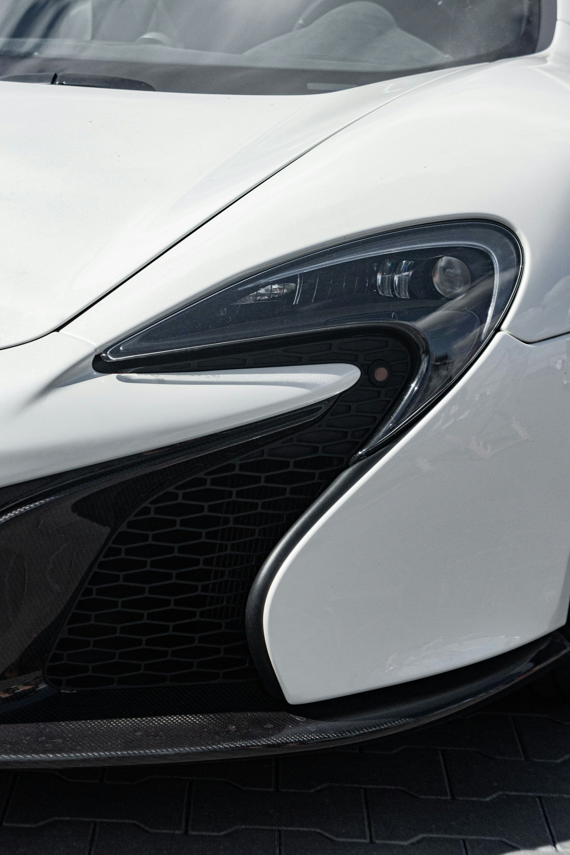 woman wearing yellow long-sleeved dress under white clouds and blue sky during daytime