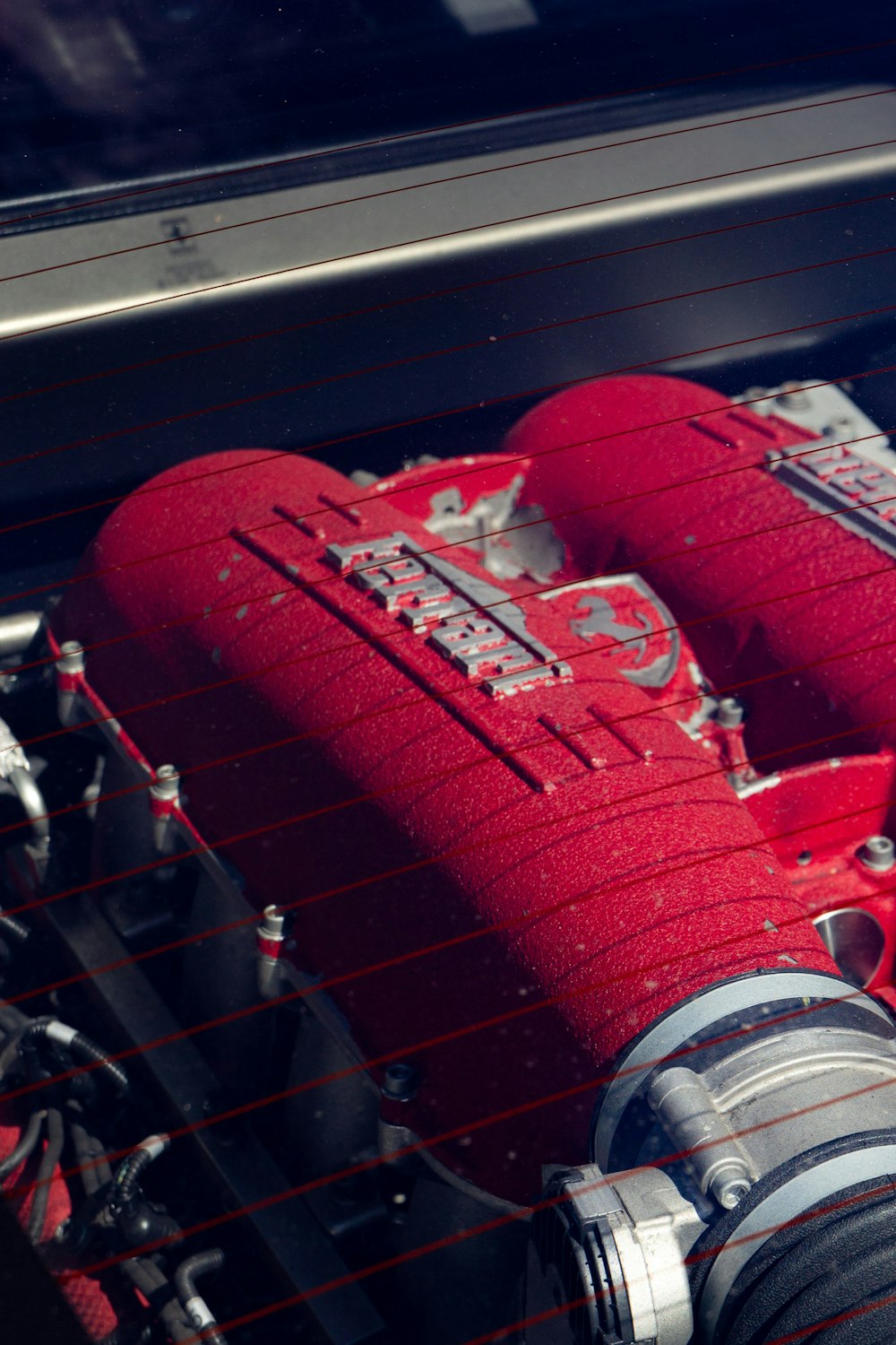 a close-up of a red car engine