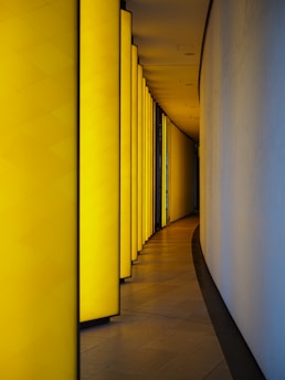 a hallway with yellow walls