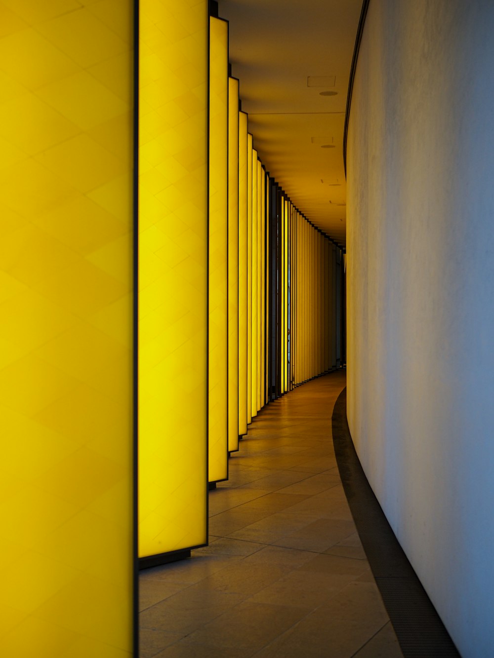 a hallway with yellow walls