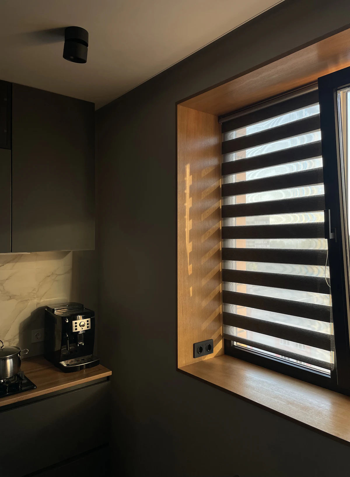 Zebra blind fitted to a window in a modern interior