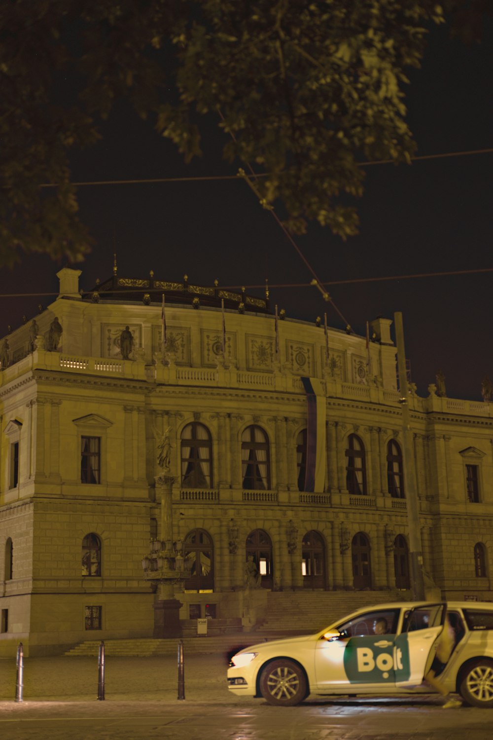 a police car parked in front of a building