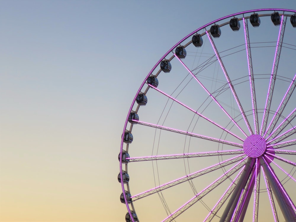 a ferris wheel with a blue sky