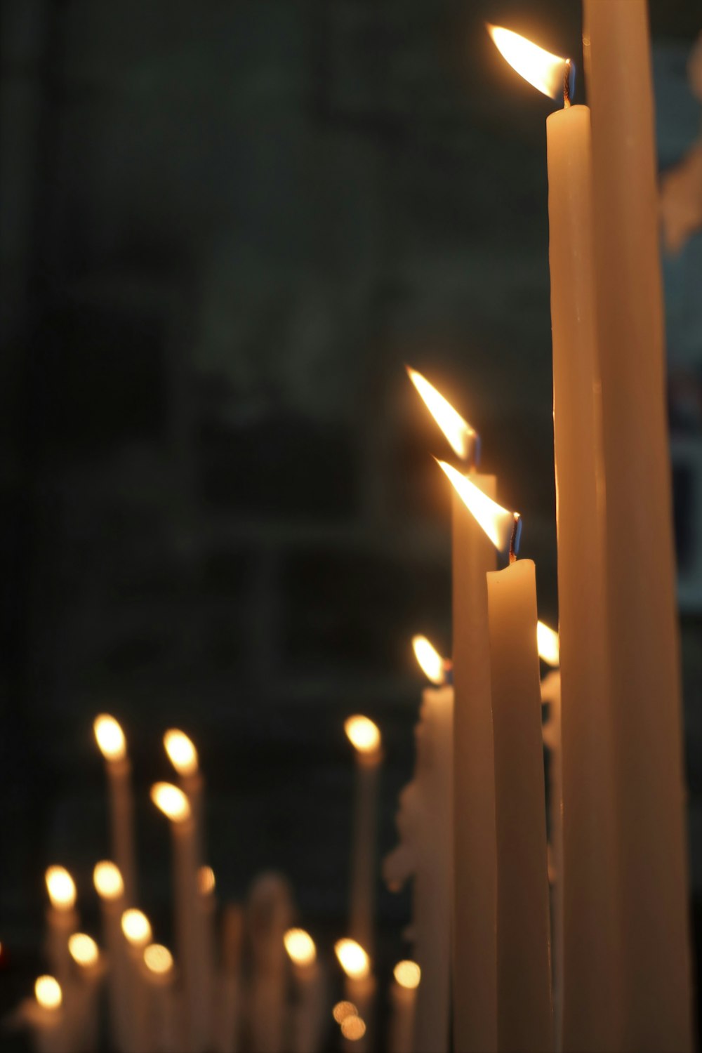 a group of lit candles