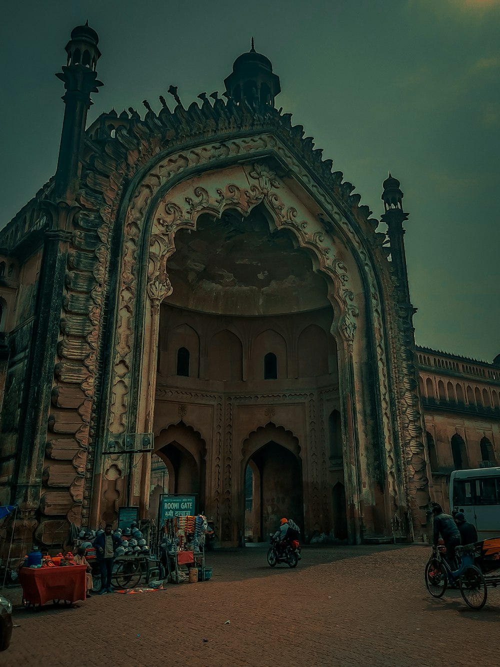 a large stone building with a large arched doorway