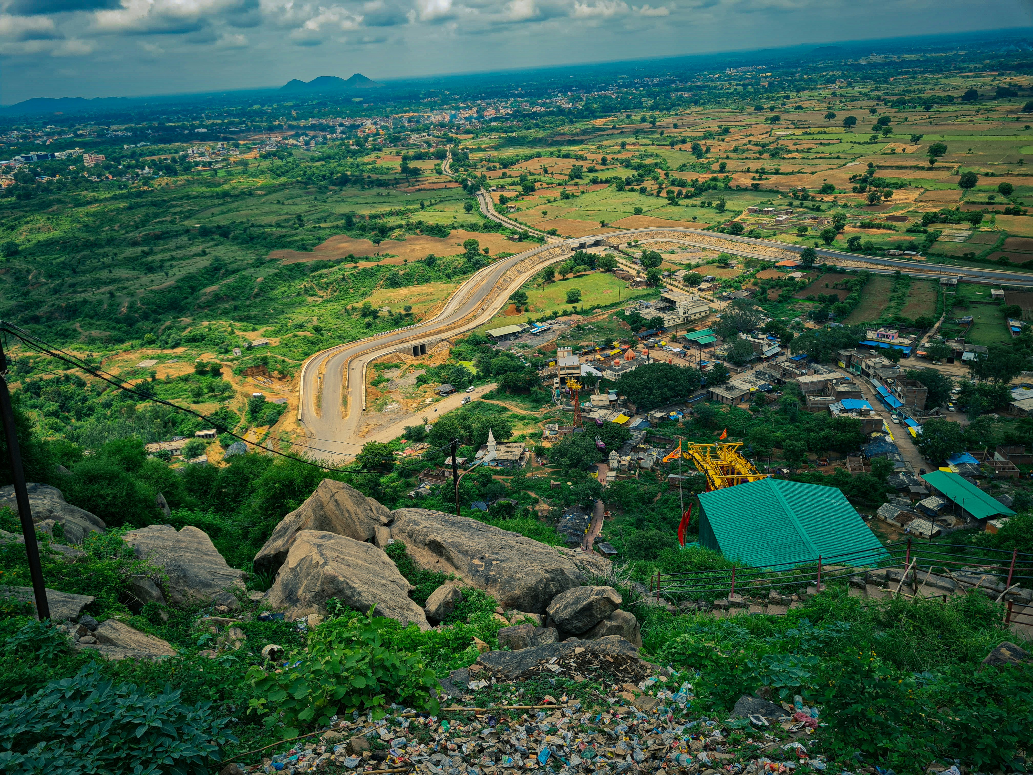 a landscape with a road and trees