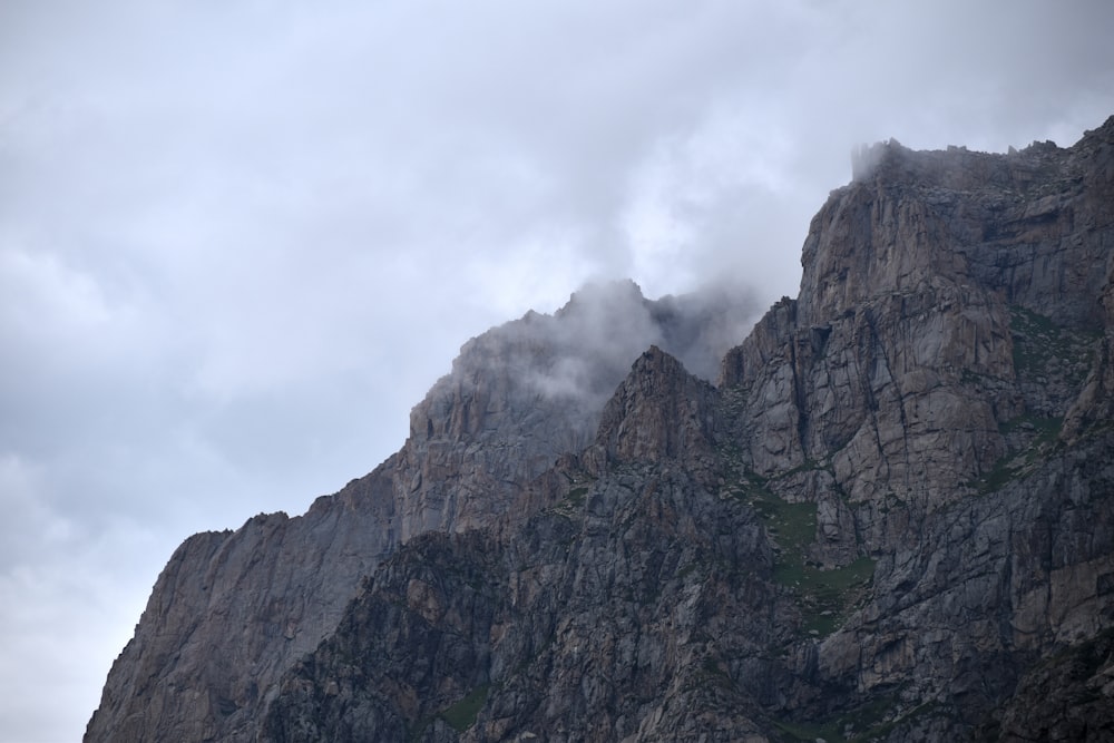 a mountain with clouds