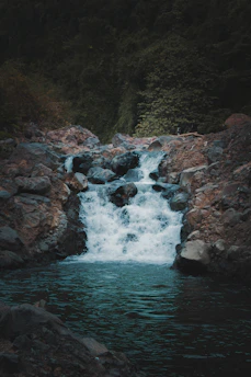 a river flowing through rocks