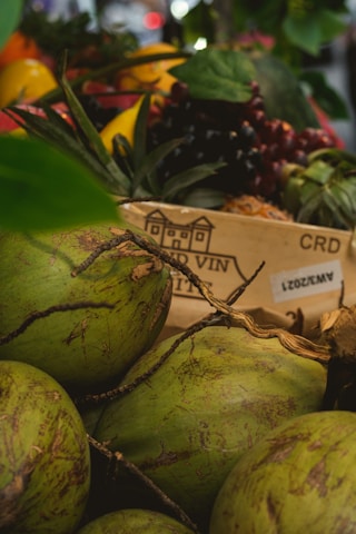 Close-up of fresh exotic fruits with hand-crafted urban packaging.