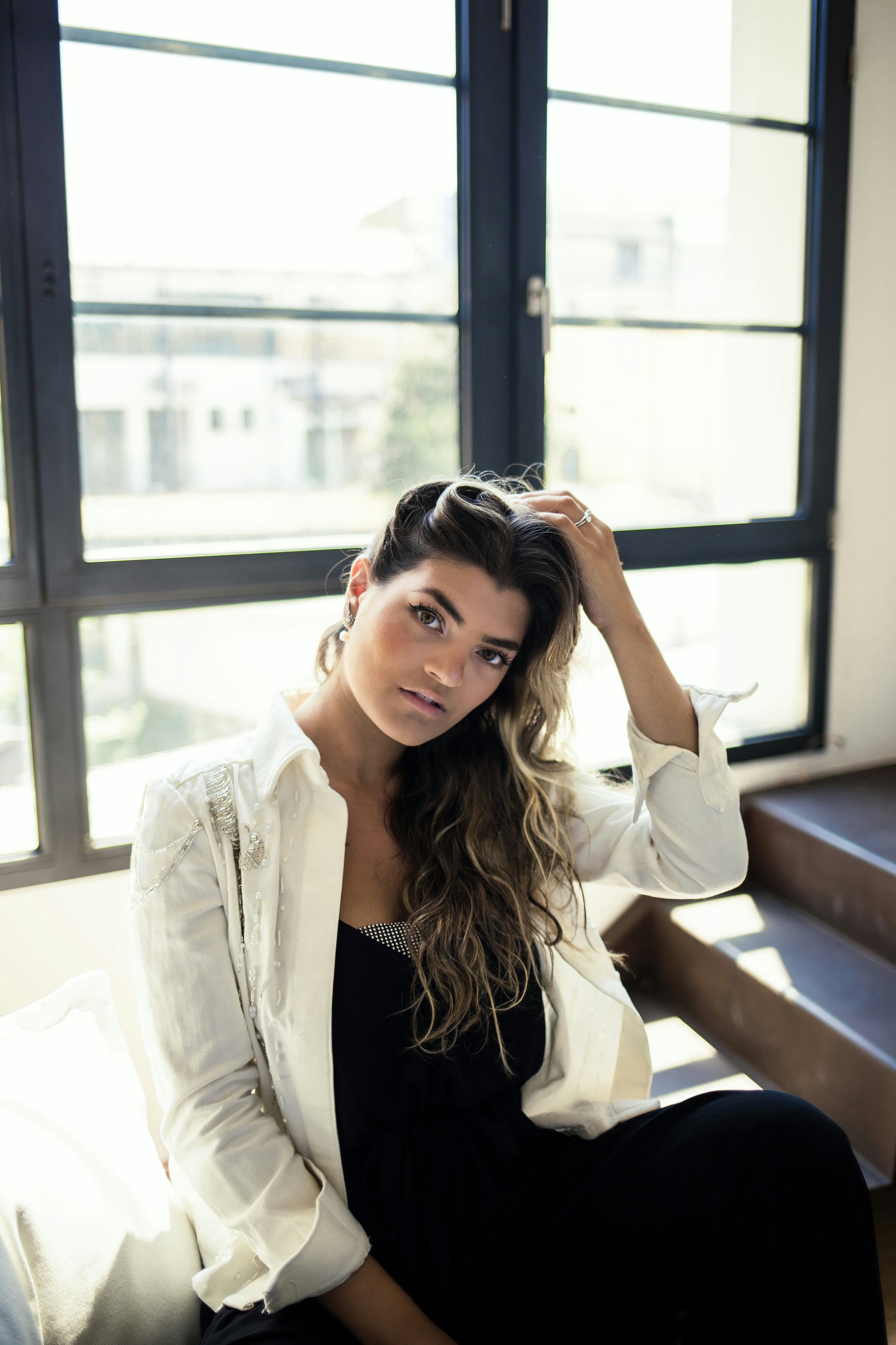 a woman sitting on a couch