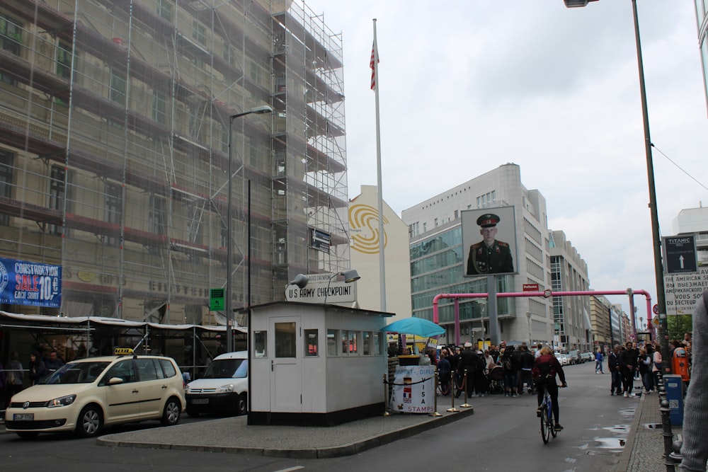 a busy street with cars and people