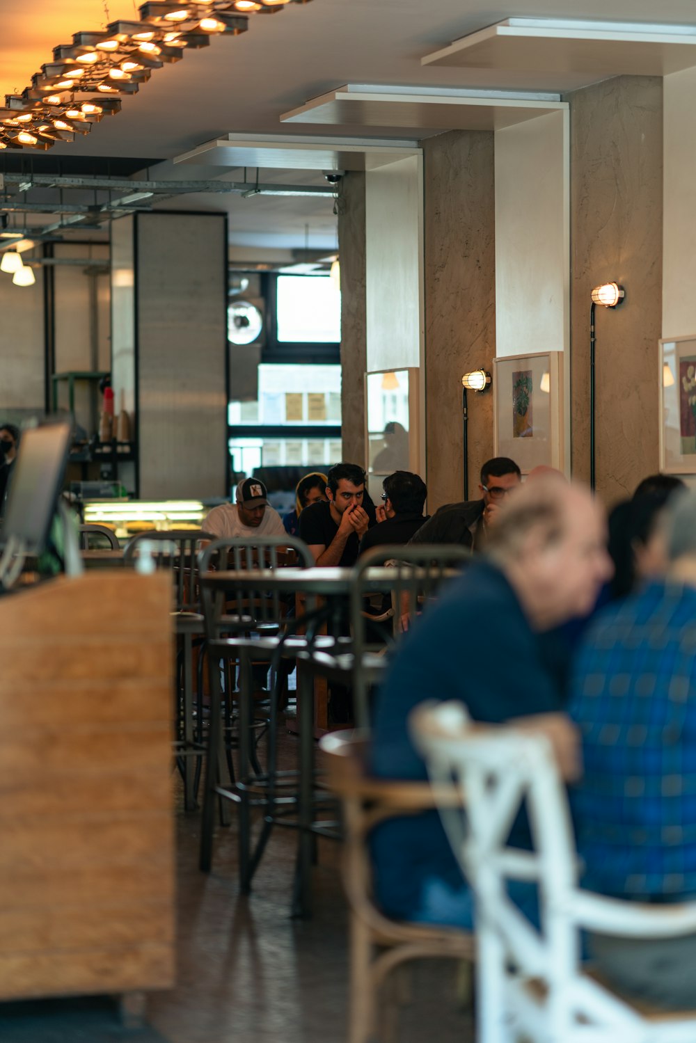 a group of people sitting at tables