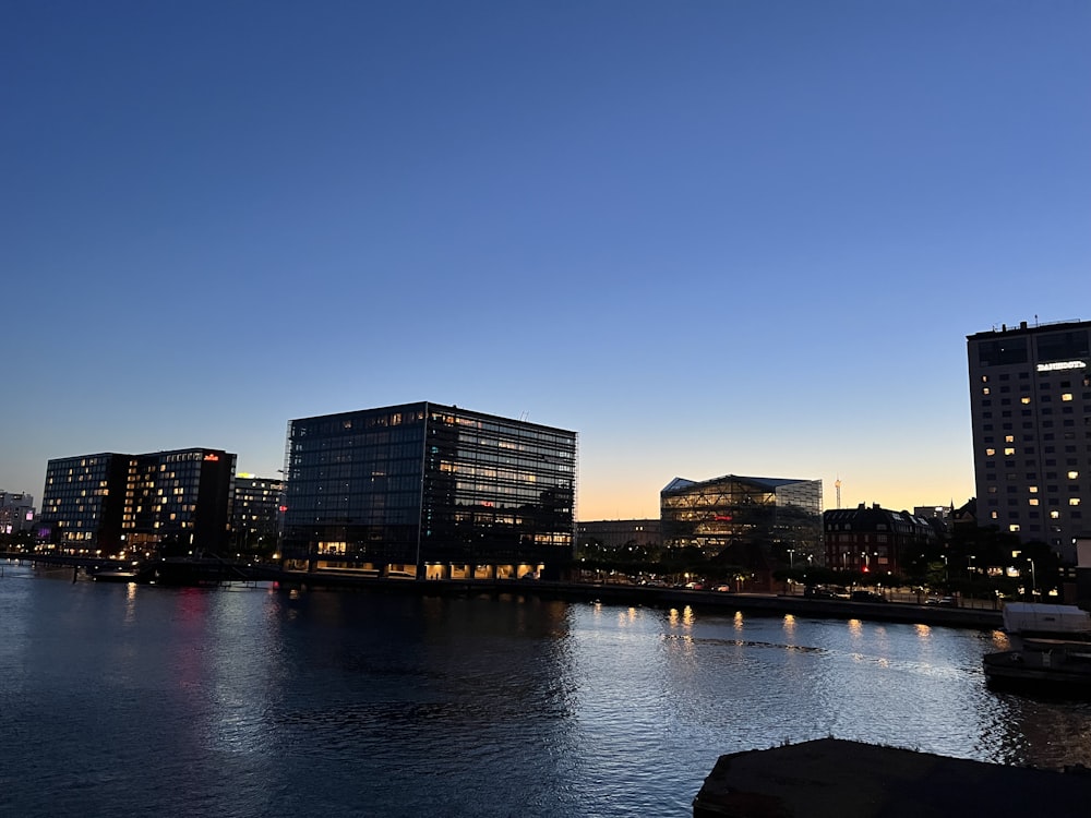 a body of water with buildings along it