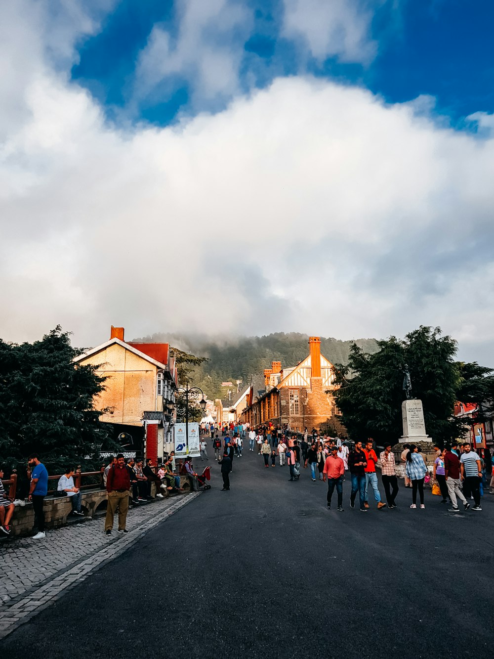 a group of people walking on a street