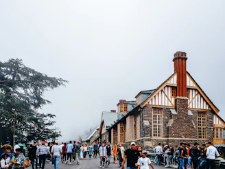 a group of people walking outside a building