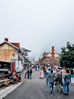 a group of people walking on a street