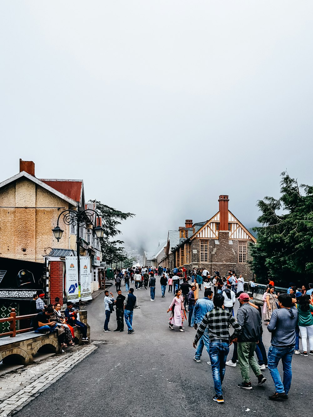 a group of people walking on a street