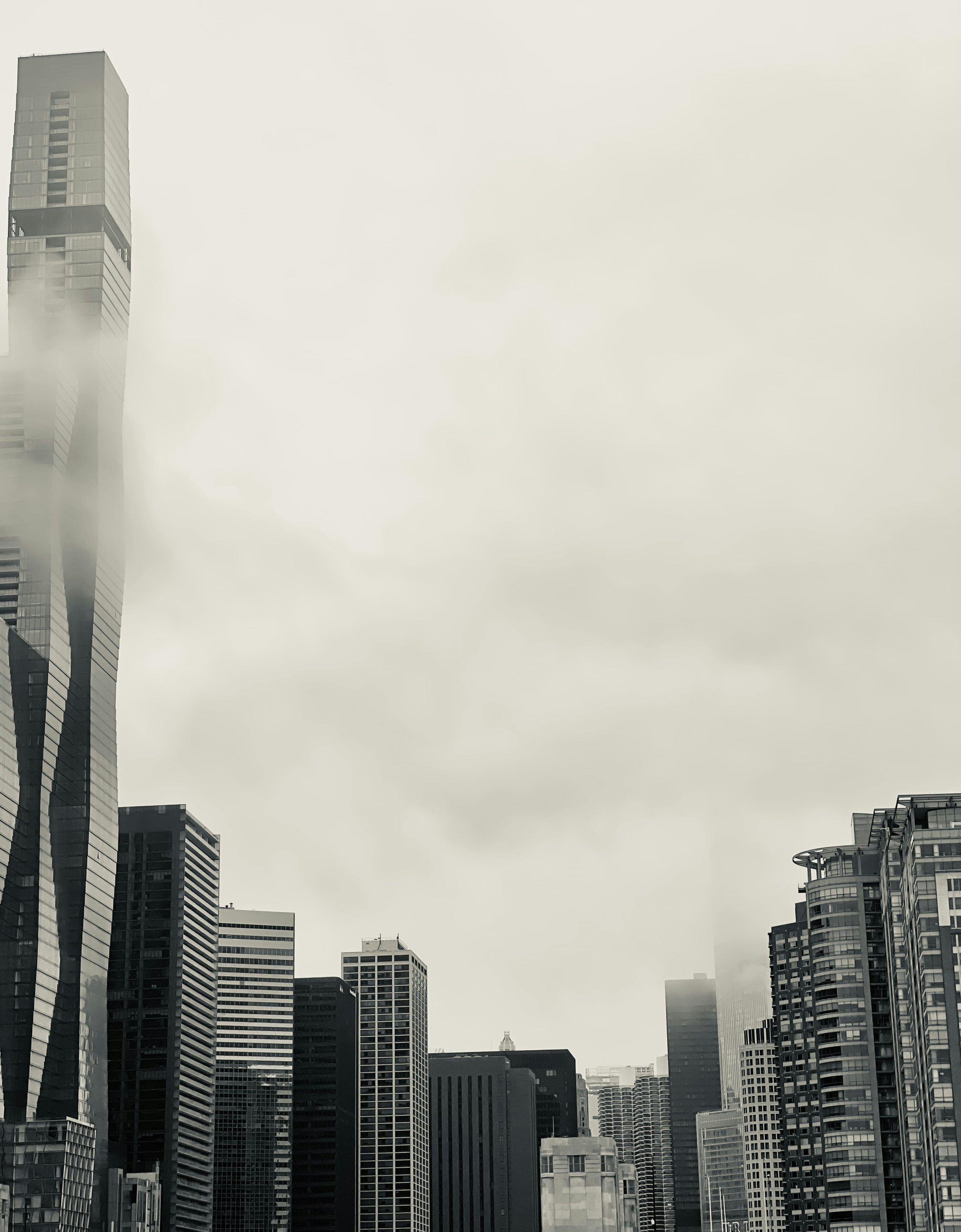 a city skyline with tall buildings