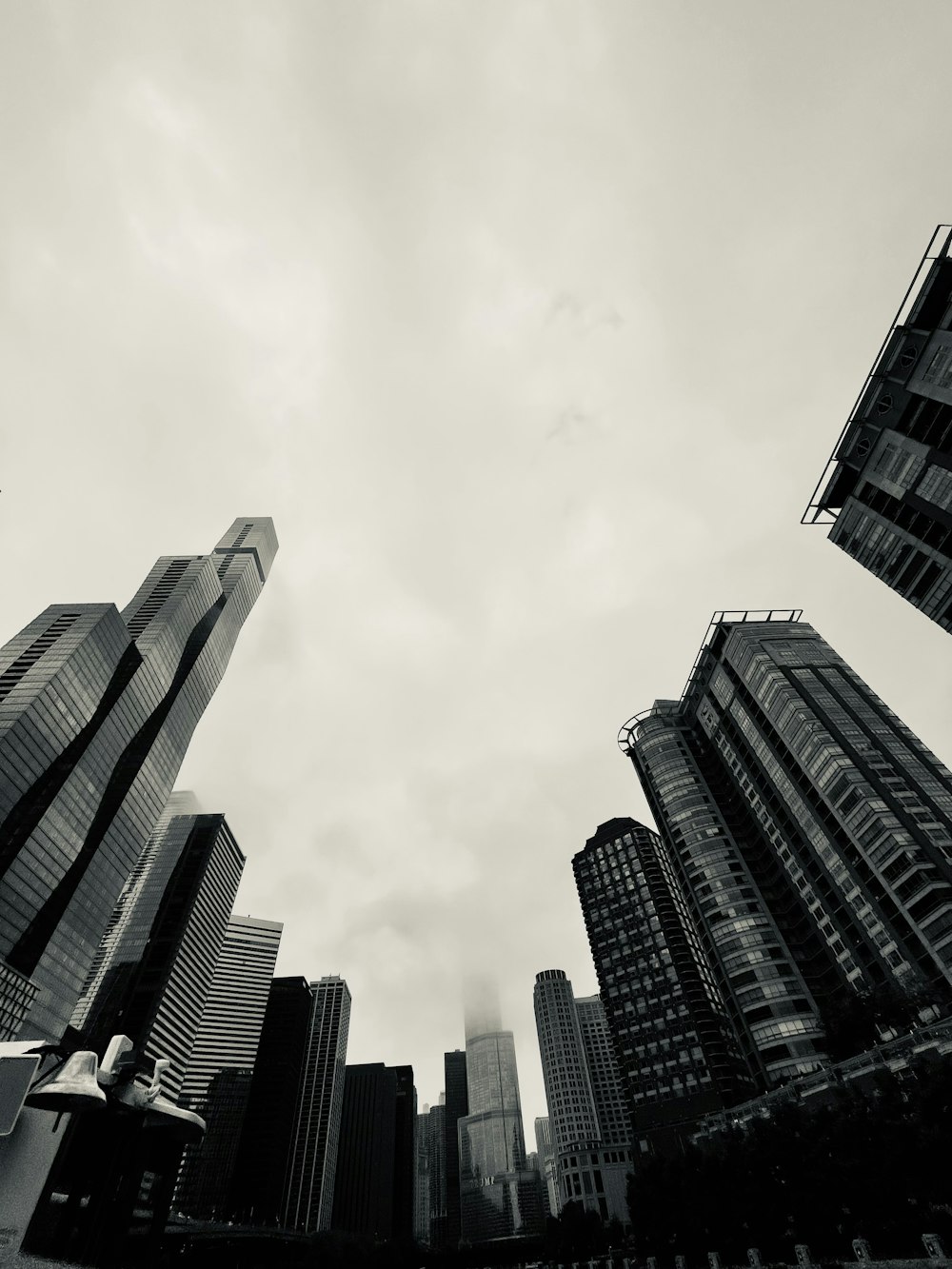 a city skyline with tall buildings