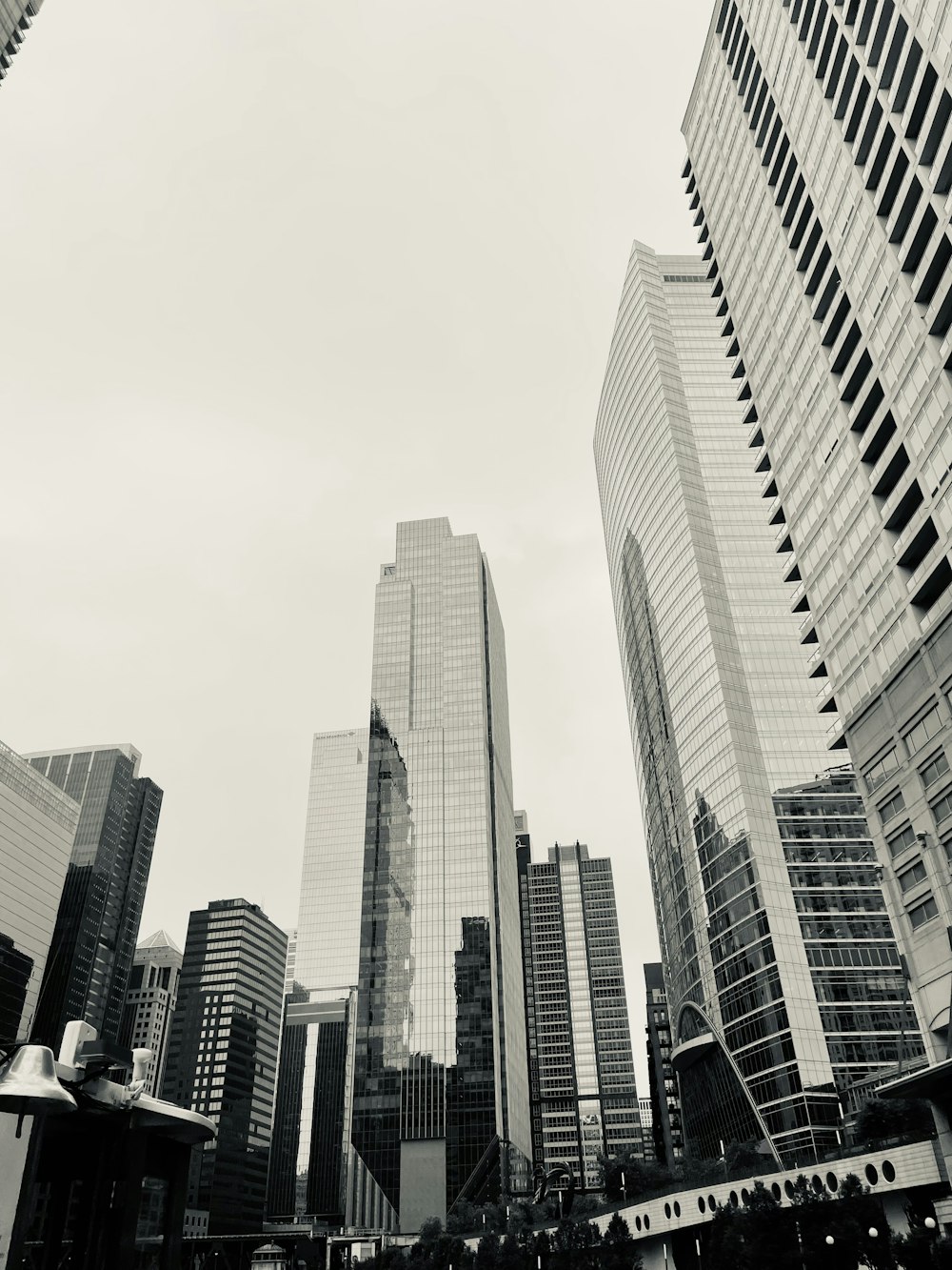 a city skyline with tall buildings