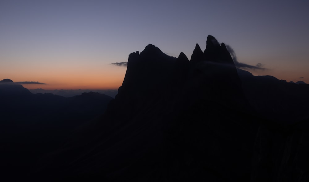 a silhouette of a mountain