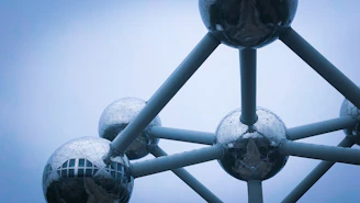 a group of large metal windmills
