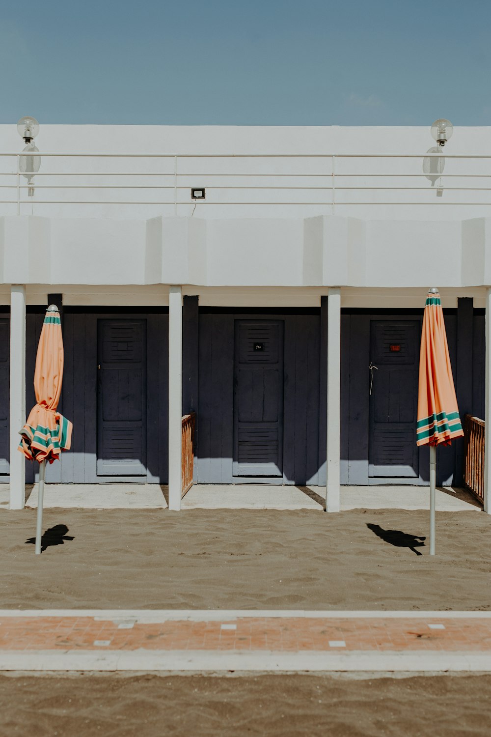 a building with umbrellas in front of it