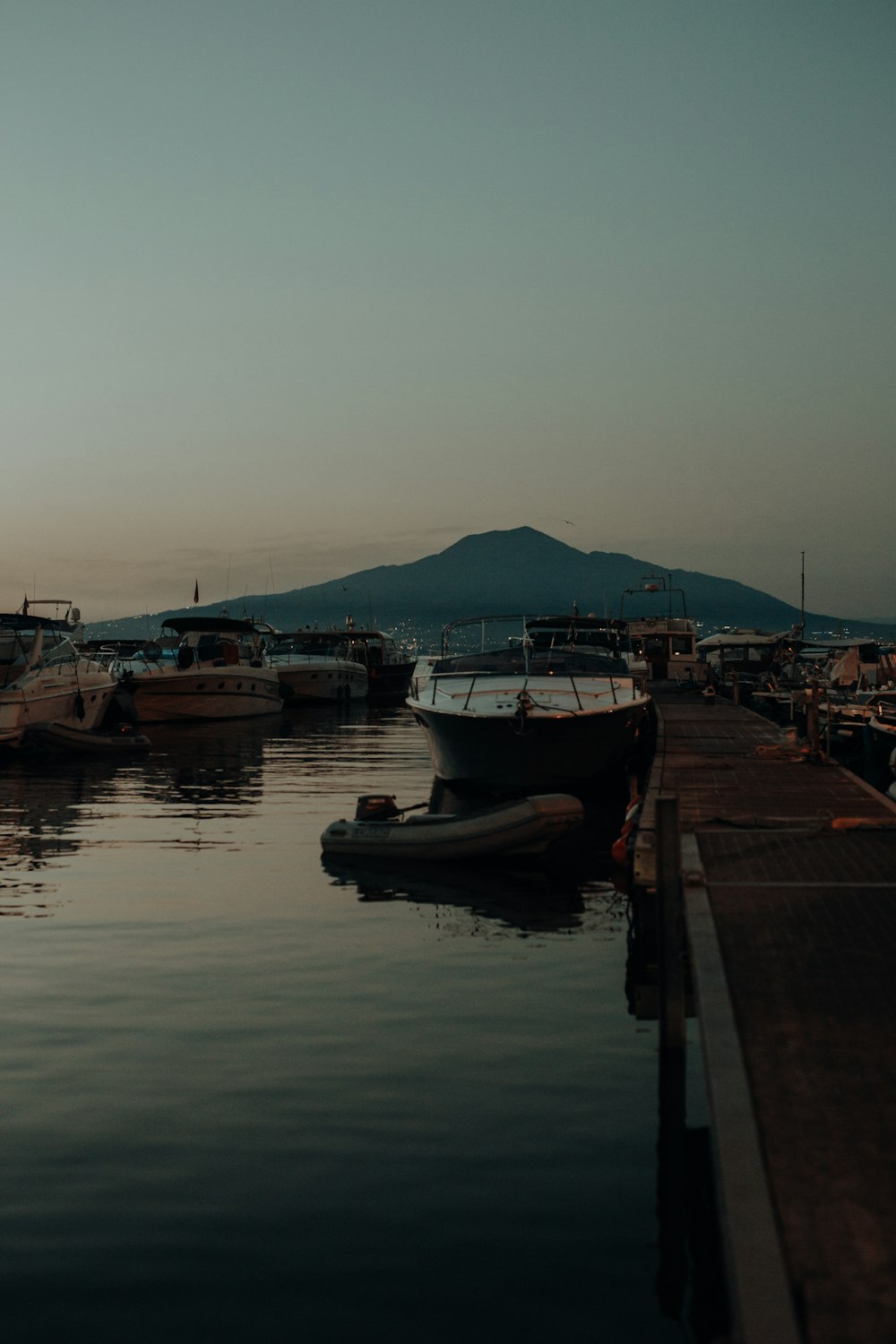 boats docked at a pier