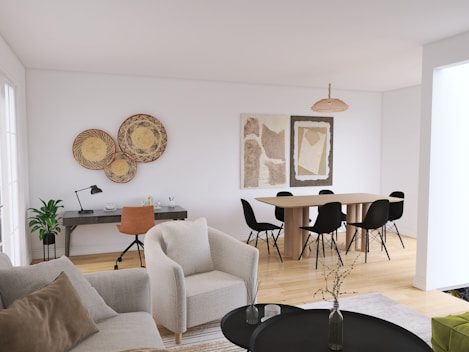 a room with a table chairs and a couch