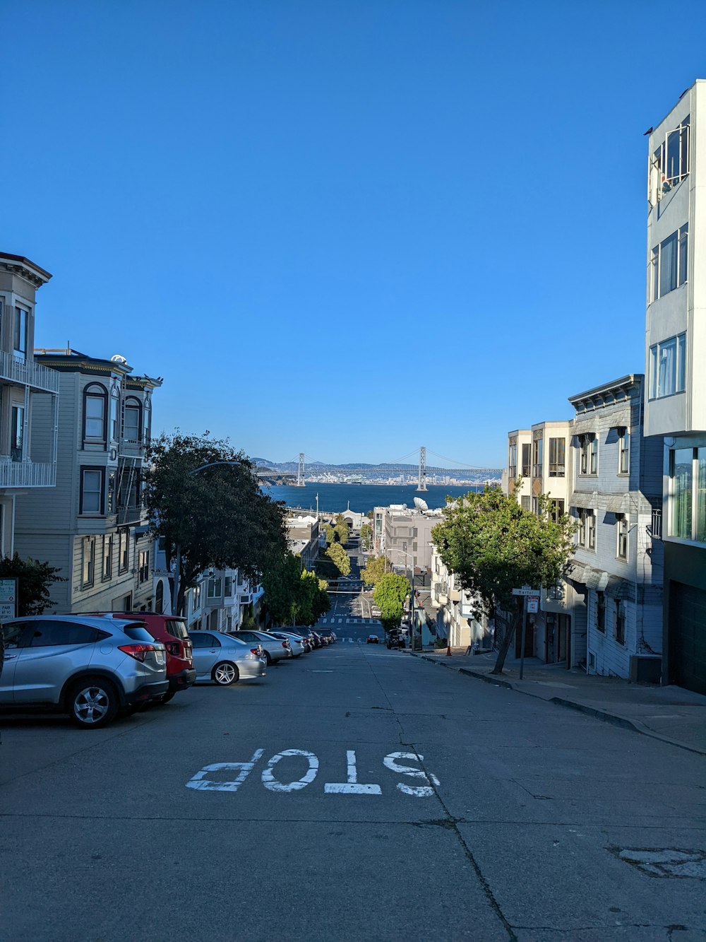 a street with cars parked along it