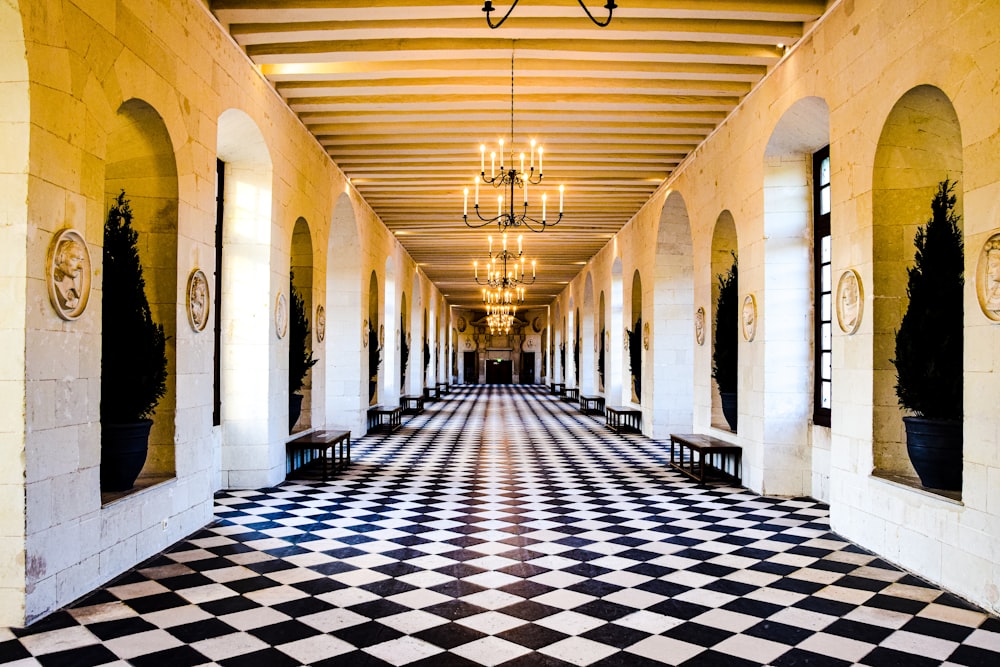 a hallway with a chandelier