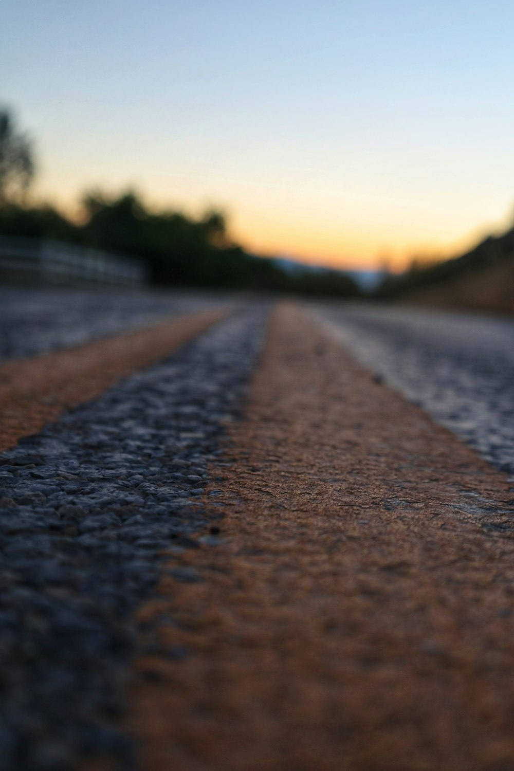 a road with a sunset