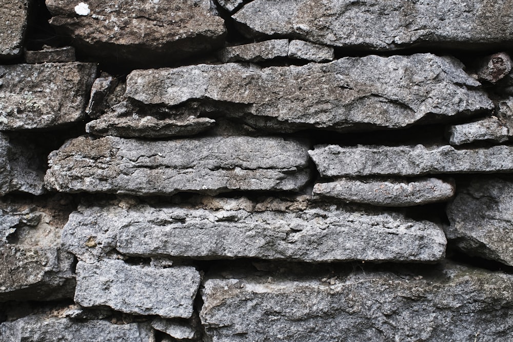 a stone wall with a hole in it