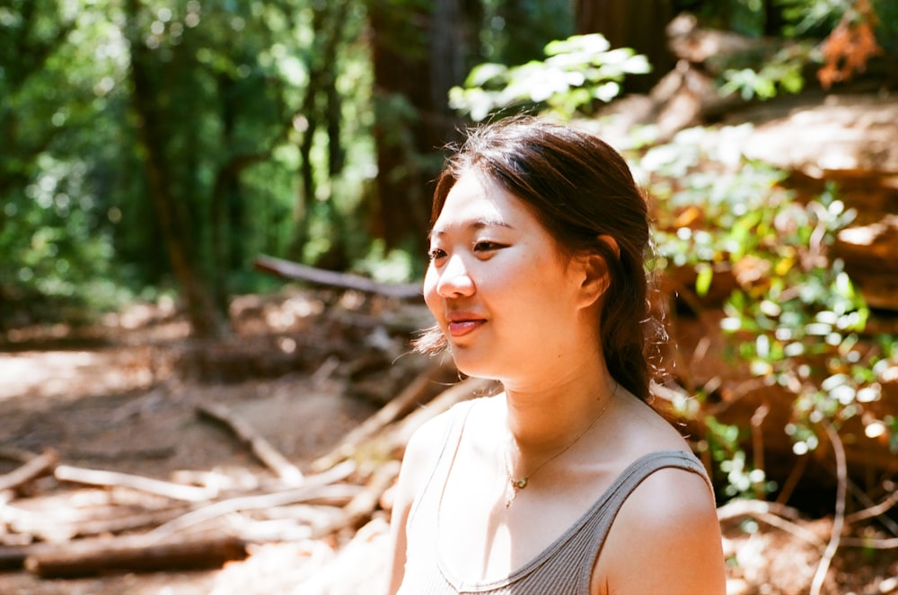 a woman in a forest