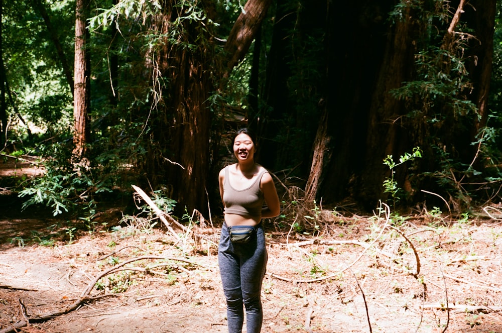 a person standing in a forest