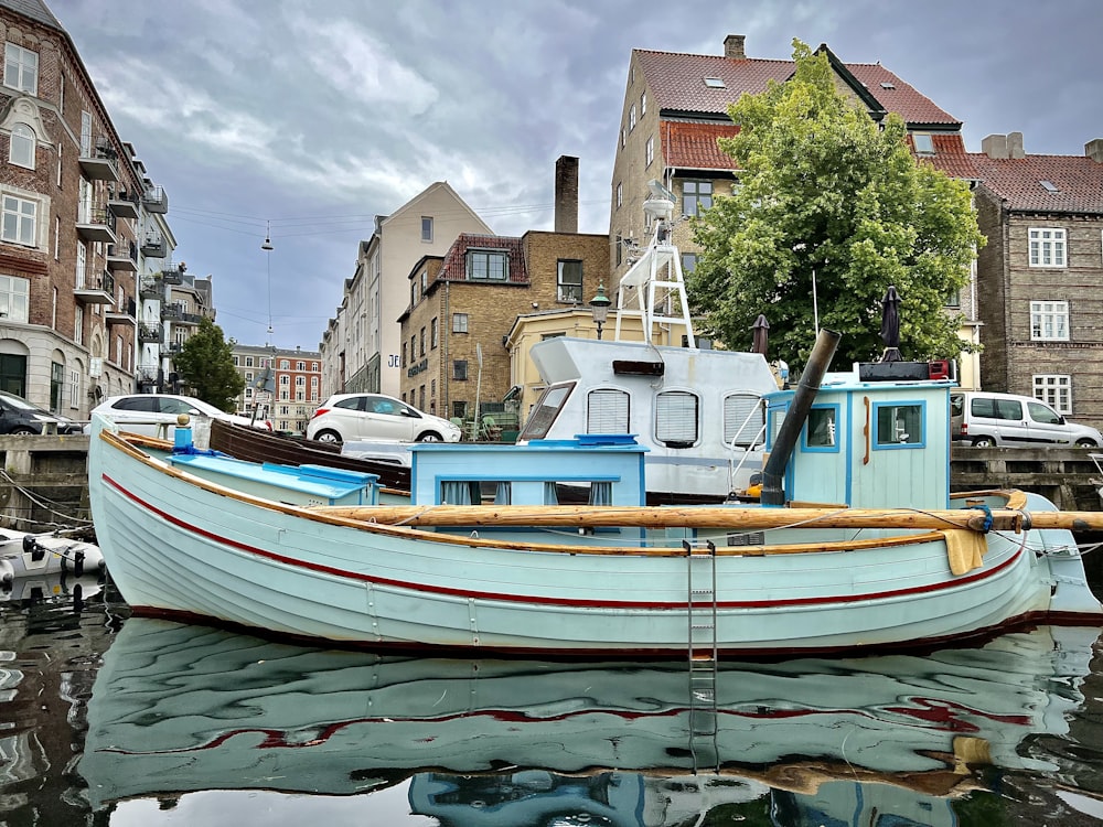 a boat docked in a canal