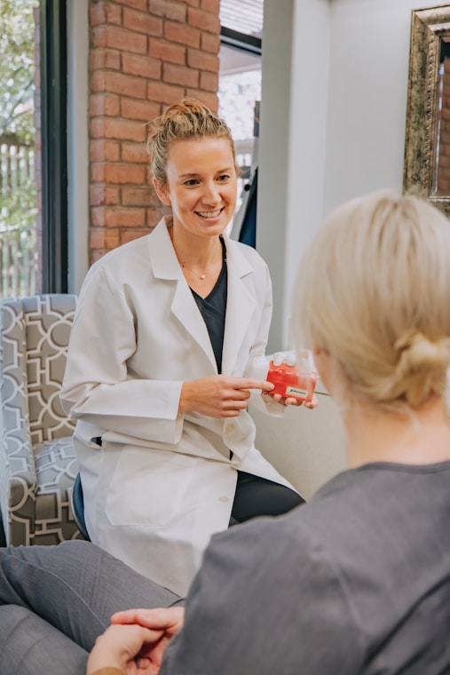 a person in a white coat