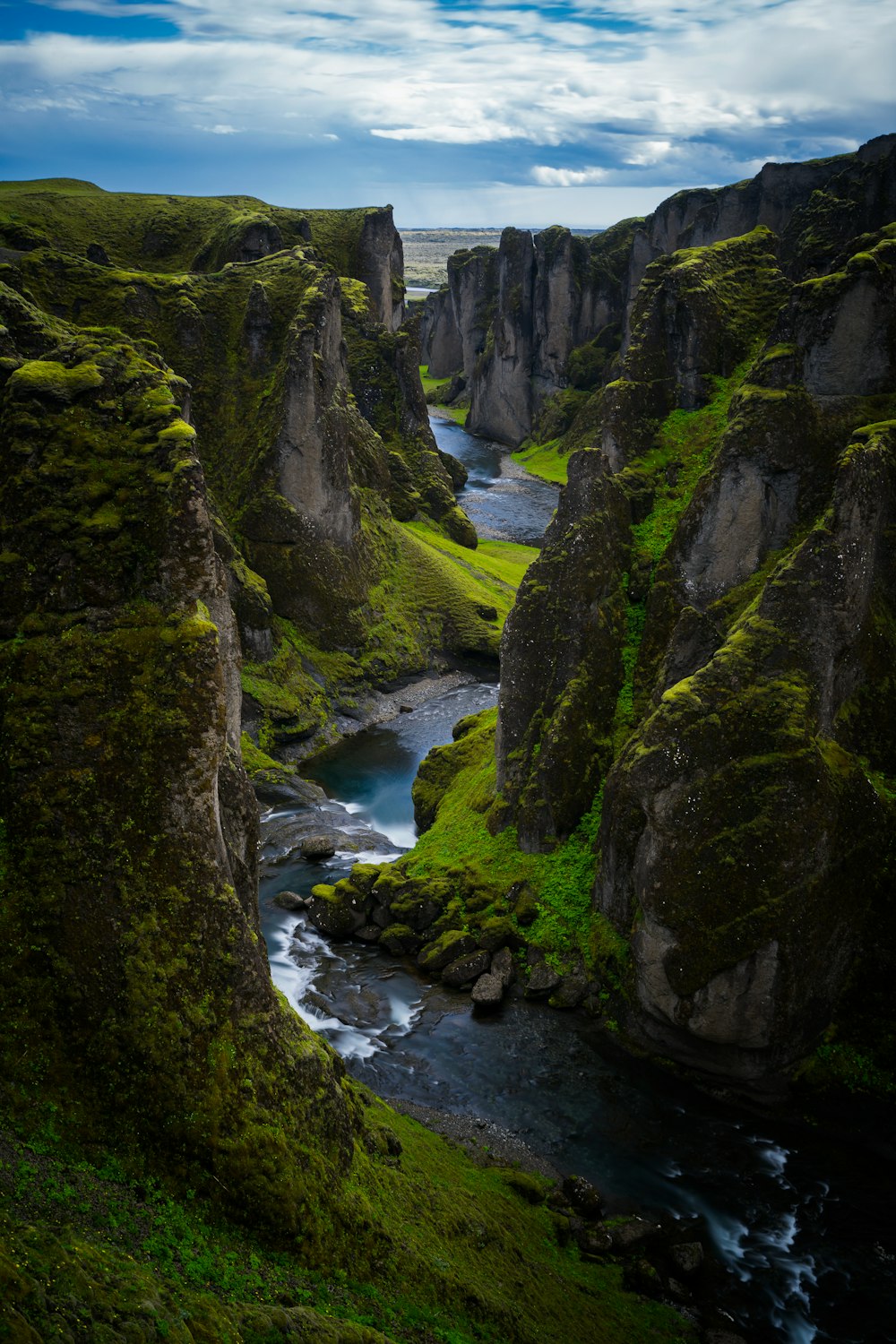 a river running between rocky cliffs