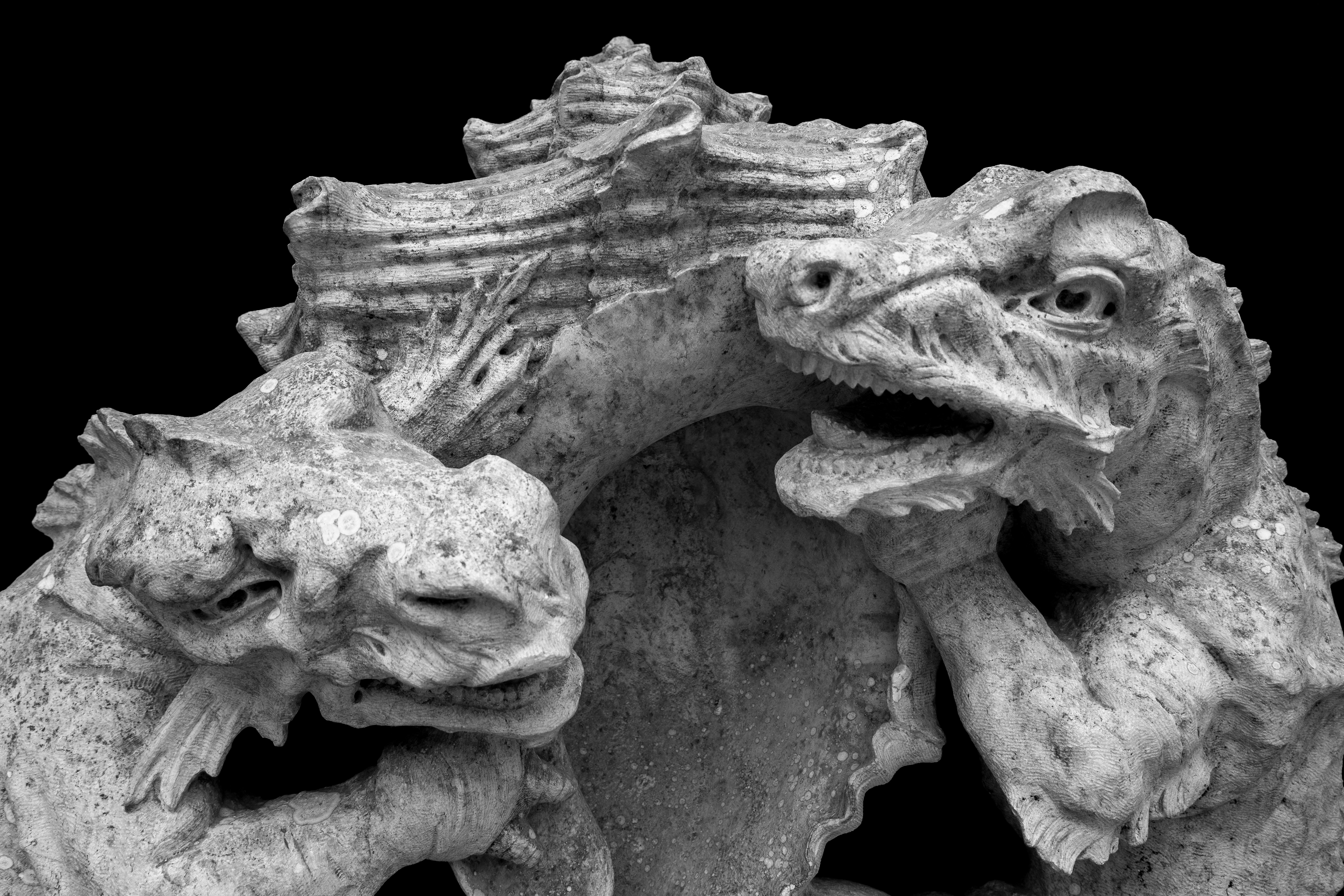 a statue of a lion and a lion