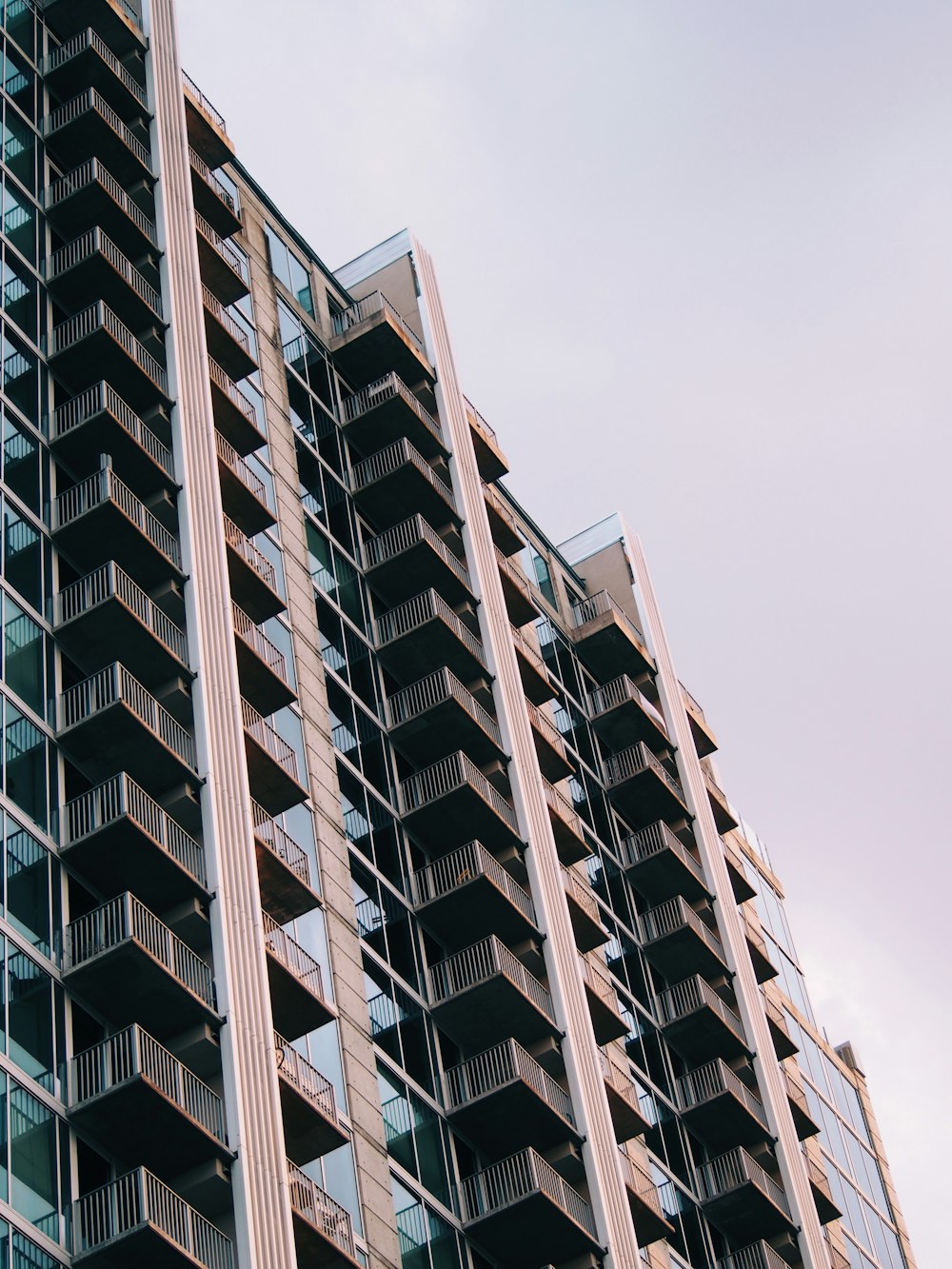 a tall building with balconies