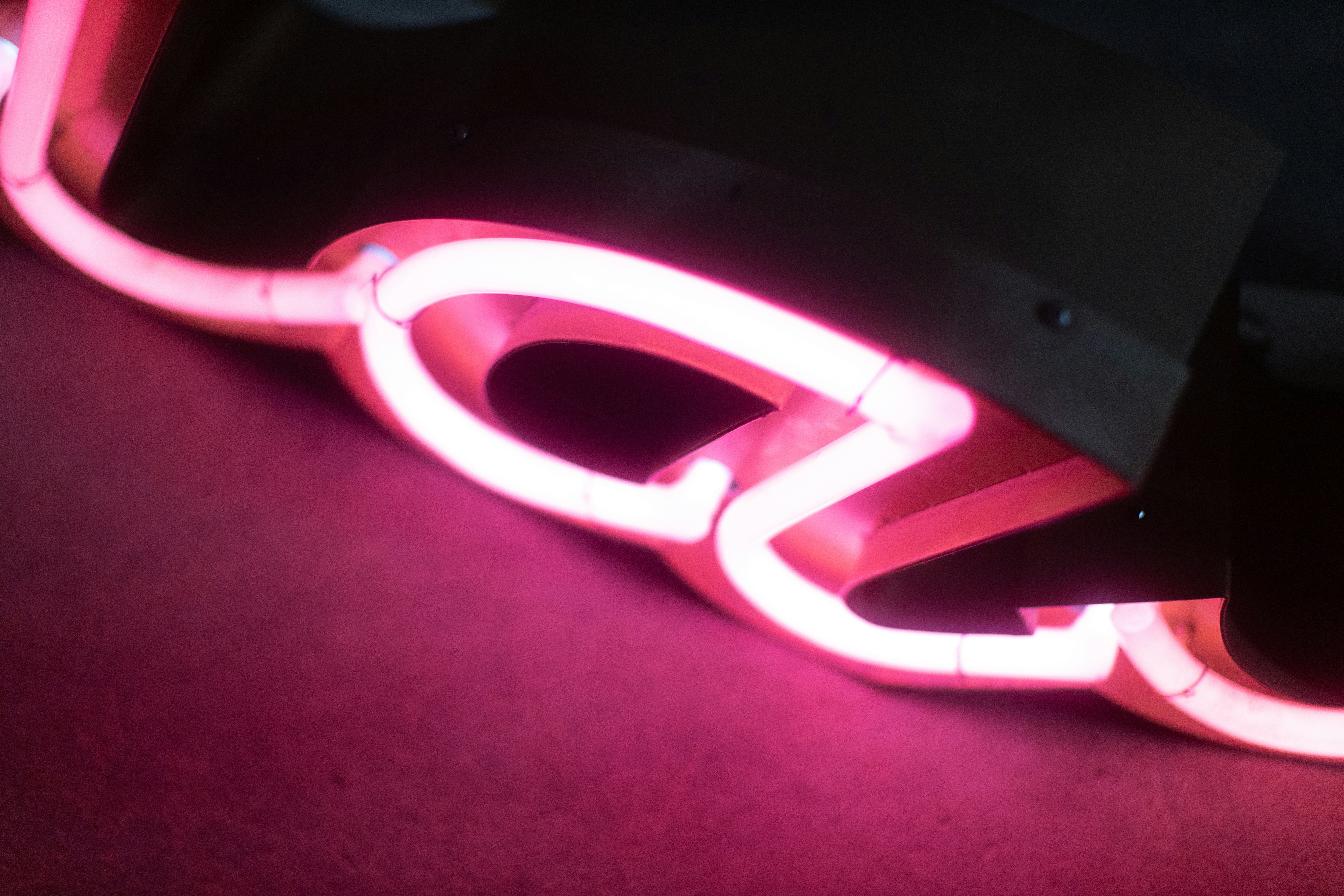 a pair of pink headphones