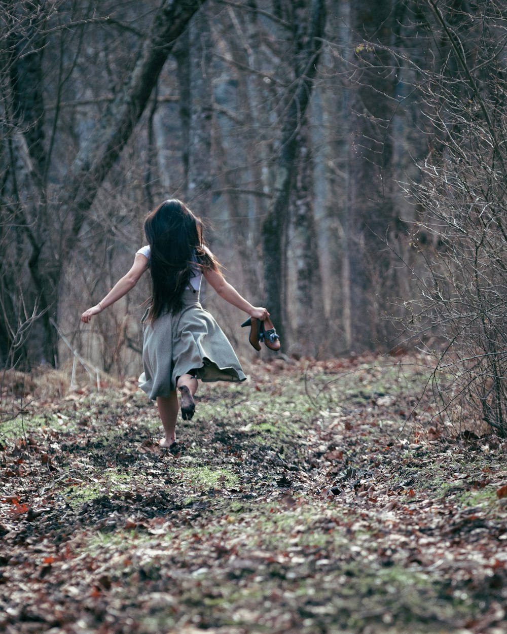 a person walking in the woods