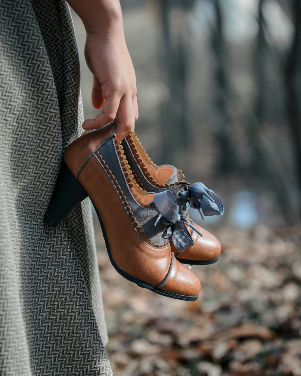 a person holding a shoe